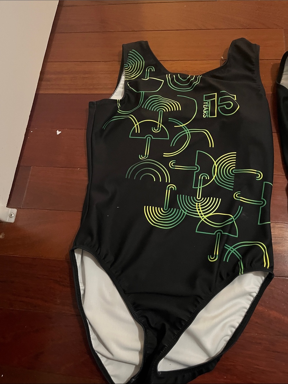 Black One-Piece Swimsuit with Neon Green Graphic Accents